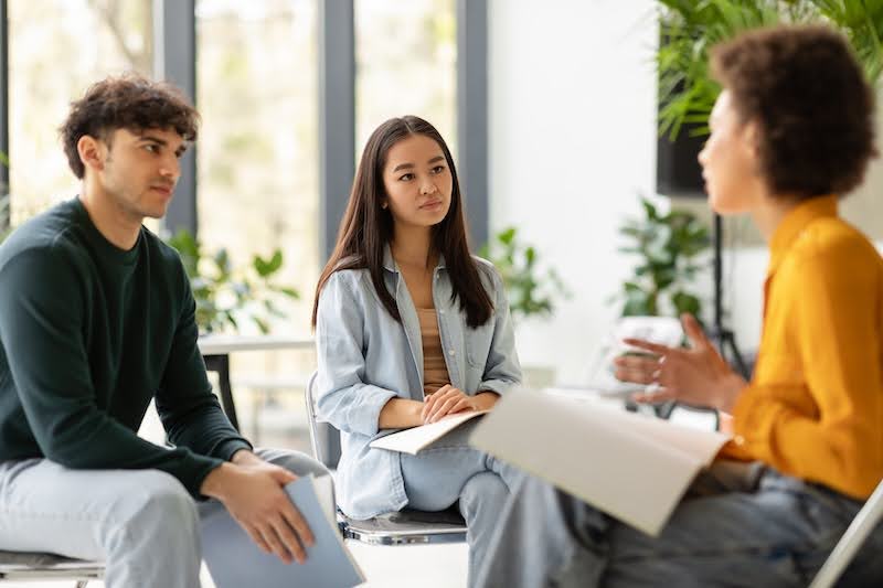 two subcontractors are listening to a hiring manager