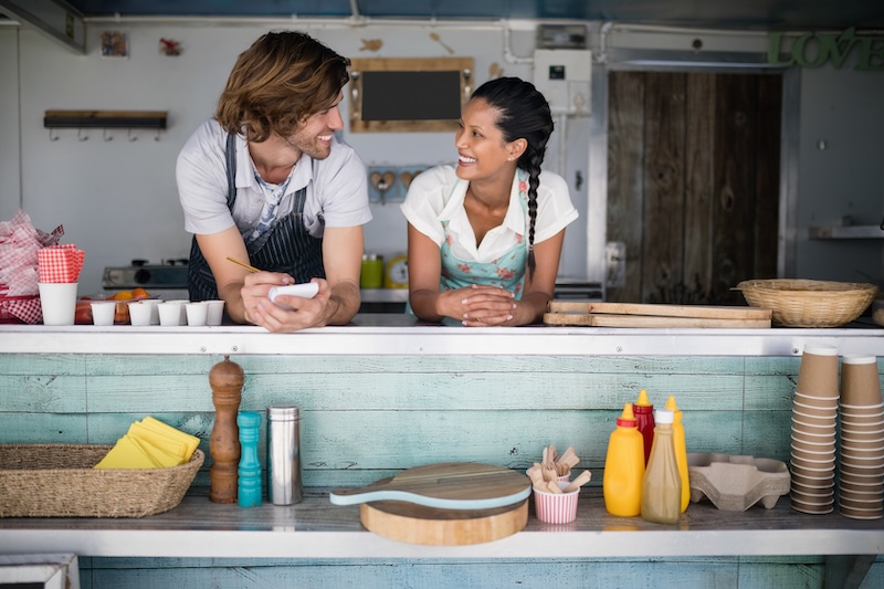 seasonal restaurant workers look at each other